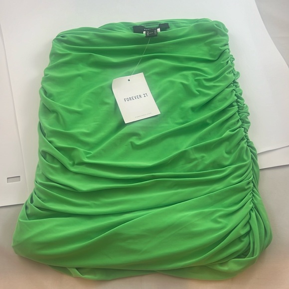 Forever 21 Dresses & Skirts - Forever 21 - bright green skirt. Cinches on the sides. NWT size Xsmall.